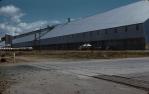 <span class="caption-caption">Bulk sugar storage shed, Mackay</span>, c1960s. <br />Slide, collection of <span class="caption-contributor">John Thun</span>.