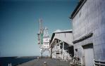 <span class="caption-caption">Sugar terminal, storage shed and bulk sugar, Mackay</span>, 1958. <br />Slide, collection of <span class="caption-contributor">Richard Hopkins</span>.